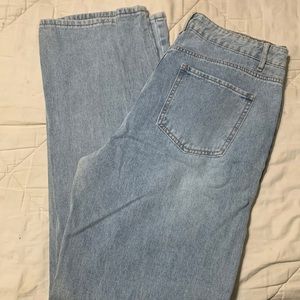 Light wash distressed jeans.  Loose fit. Shein - L